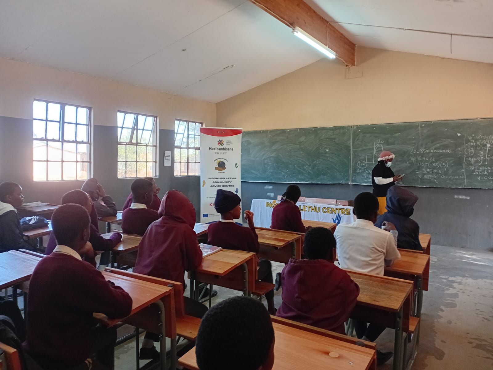 Classroom awareness session with learners seated at desks